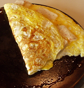 eggs (omelette) on a cast iron griddle