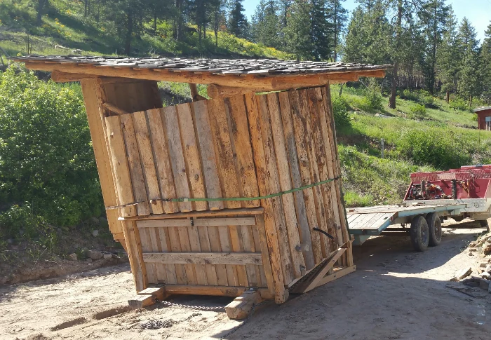 Completed WilloWonka outdoor Willow Feeder on log skids